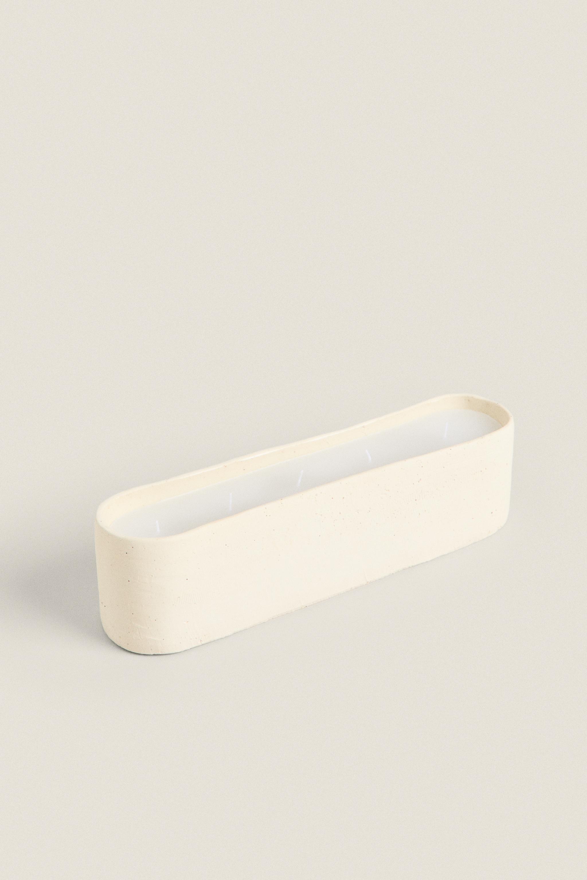 ELONGATED CERAMIC DECORATIVE CANDLE